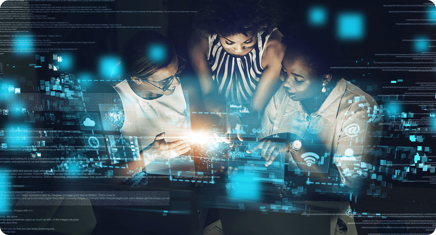 3 women working on a project on a computer