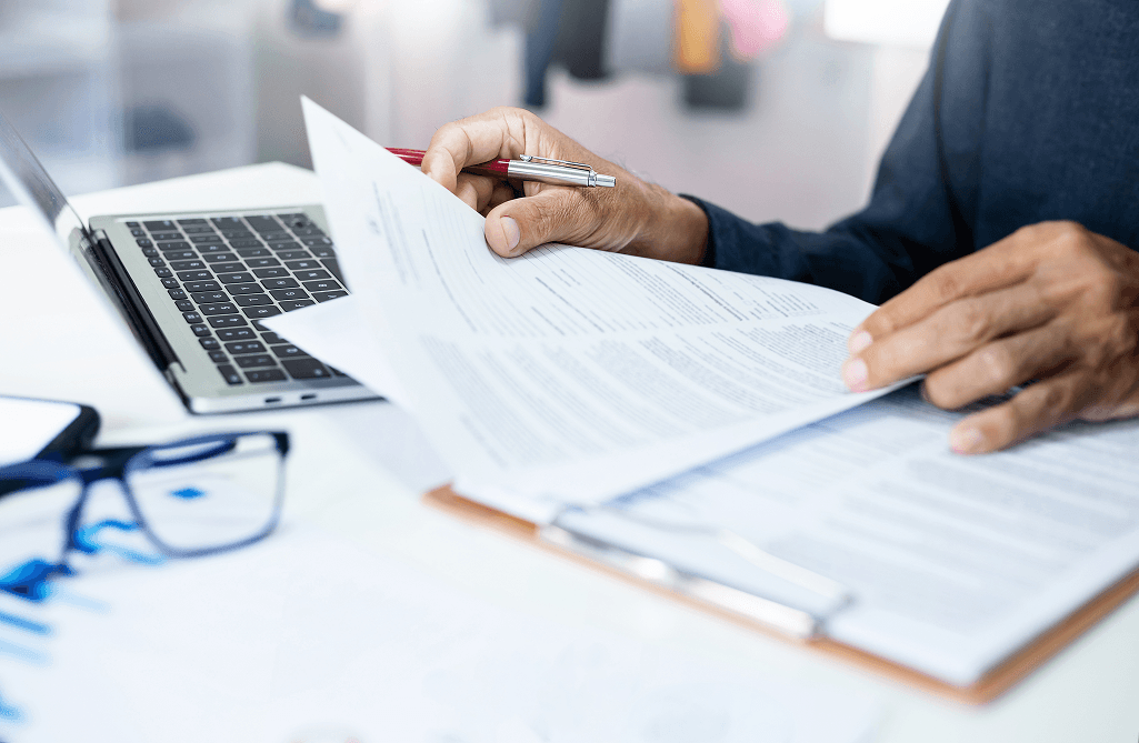 property manager sorting through paperwork