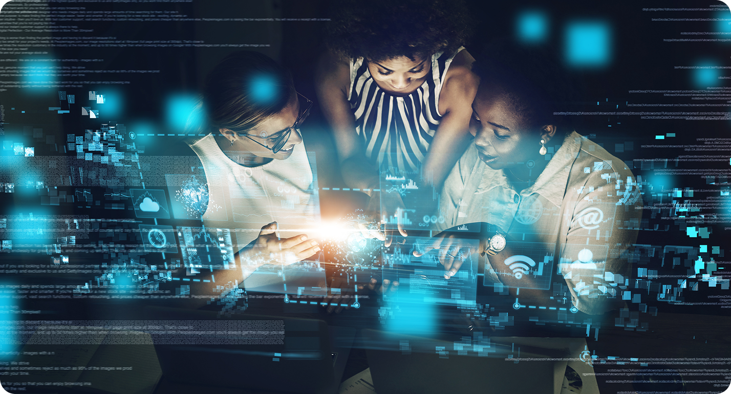 3 women working on a project on a computer
